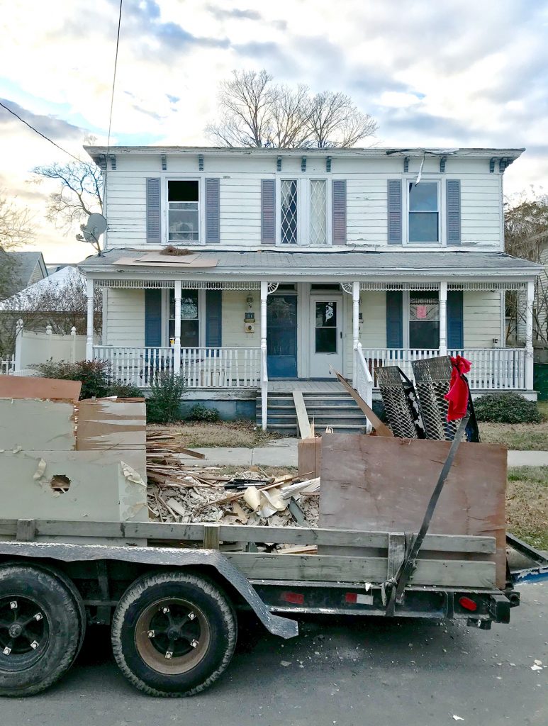 Duplex Pre Demolition With Truck Full Of Debris From Clean Out