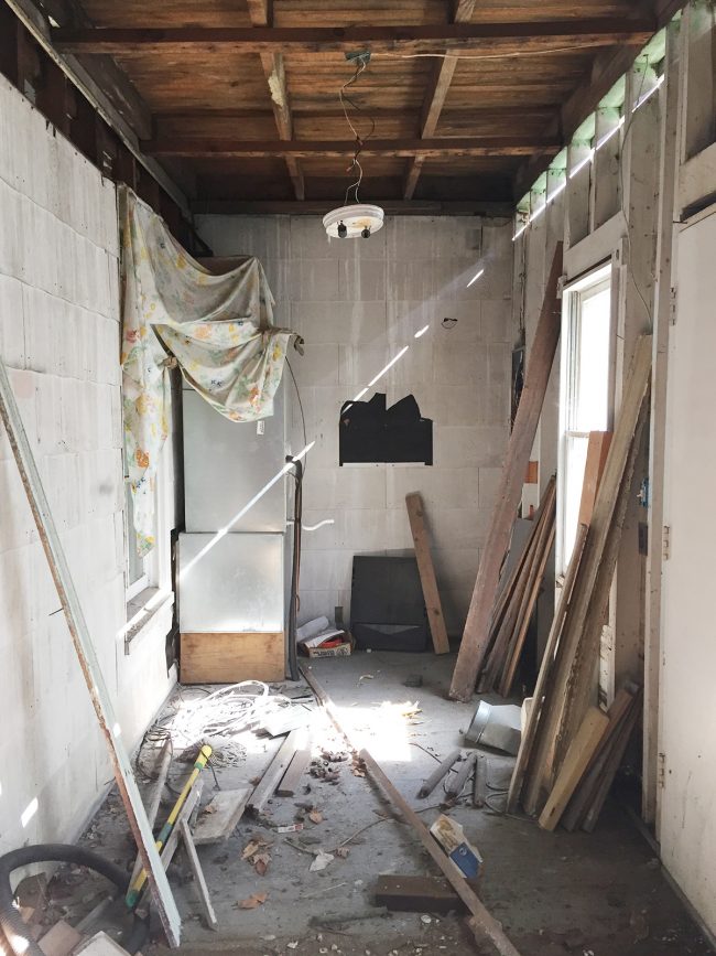 Before Photo Of Beach House Laundry Room Mudroom With Falling Apart Walls