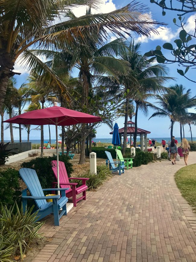 colorful beach chairs and umbrellas at Lauderdale By The Sea Florida