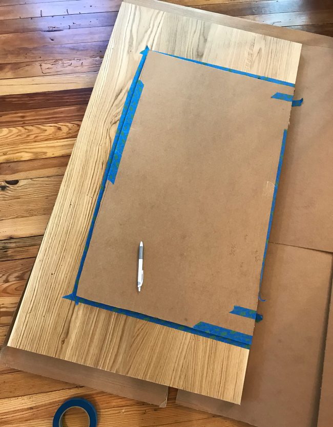 Cardboard Template On Butcher Block Counter Before Cutting