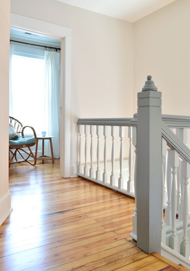 After Photo Of Beach House Upstairs Hallway With Painted Wood Railings