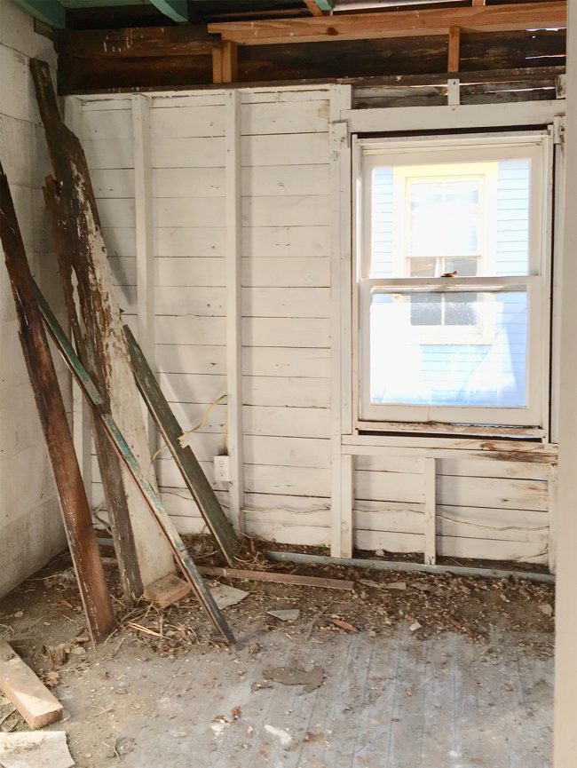 Other Side Of Beach House Bunk Room Before With Crumbling Siding