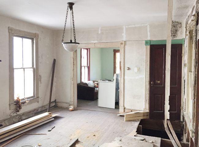 Before Photo Of Beach House Dining Area With Mismatch Trim And Moldy Walls