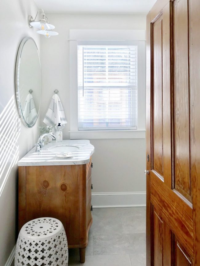 After Photo Of Beach House Upstairs Hall Bathroom With Vintage Wood Vanity With Marble Top