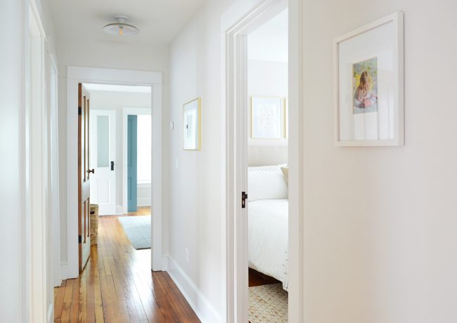 After Photo Of Beach House Middle Bedroom Seen Through Hallway Created By Adding Wall
