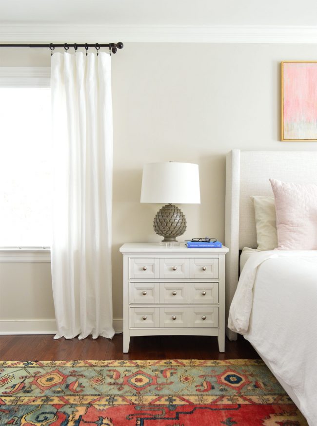 white ikea lenda curtain panels next to nightstand