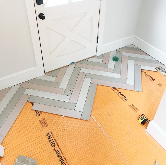 Duplex Tile Herringbone Mudroom Started