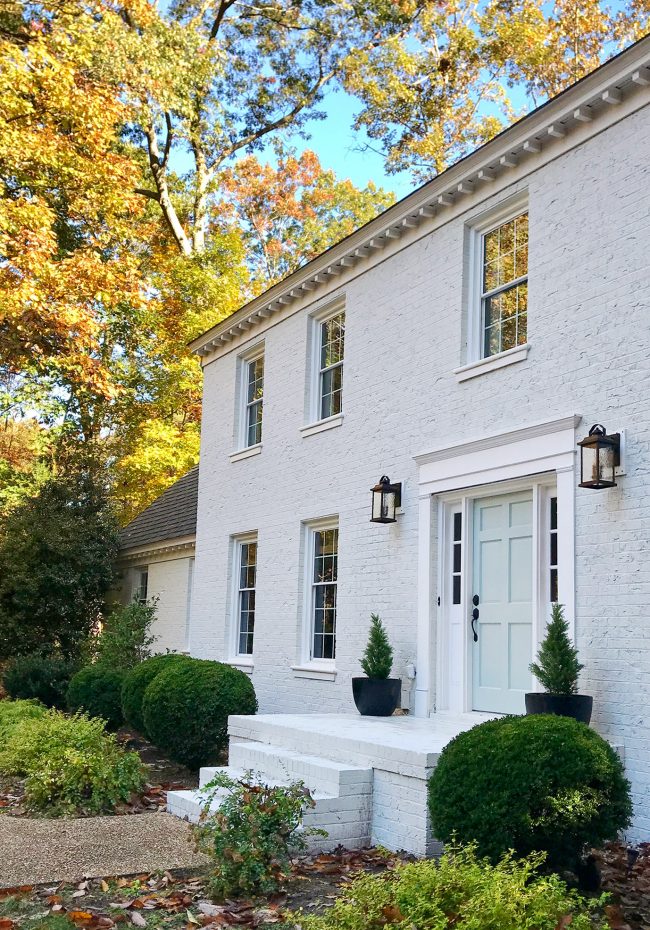 Painted Brick House White AFTER Door With Foliage