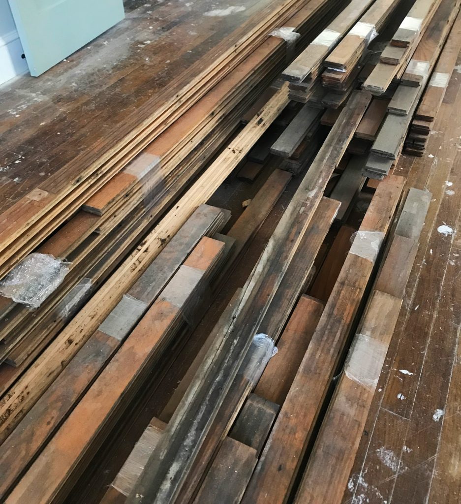 Duplex Floor Refinish Stacks Of Reclaimed Wood