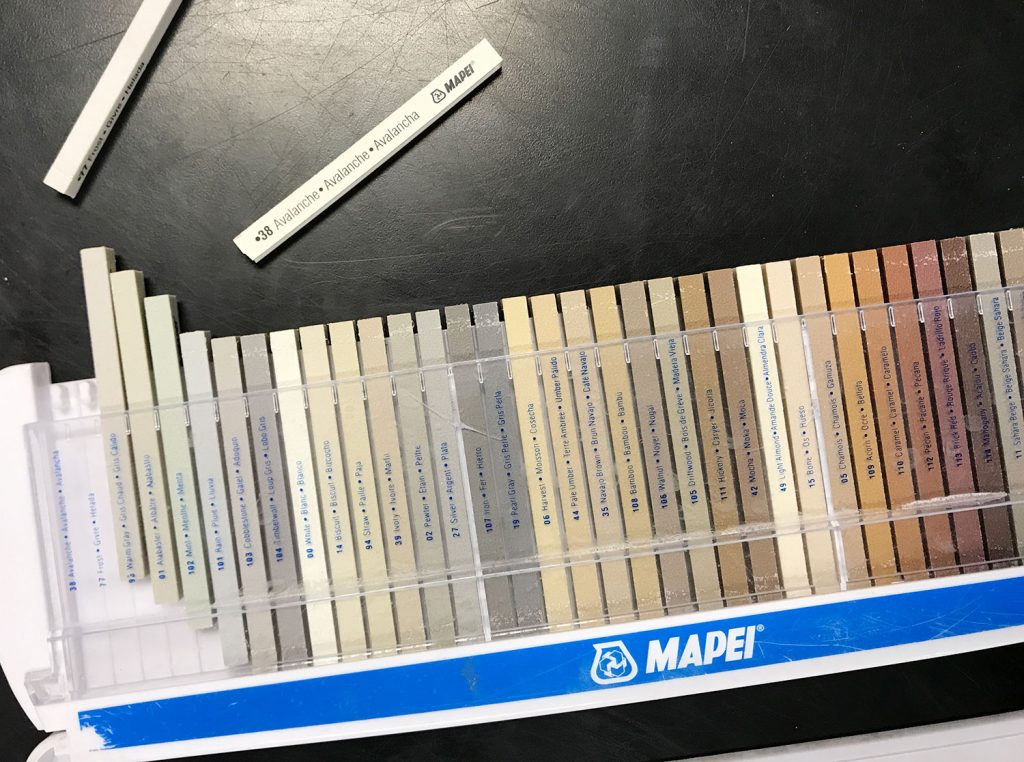 mapei grout color sample sticks at store