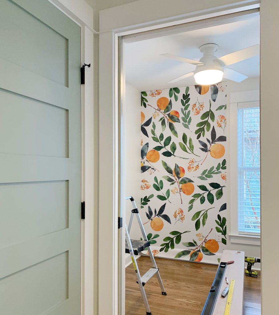 Removable Orange Blossom Wallpaper Installation With Blue Painted Door