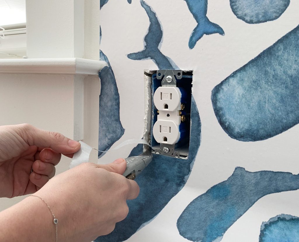 Installing Removable Wallpaper By Cutting Around Electrical Outlet
