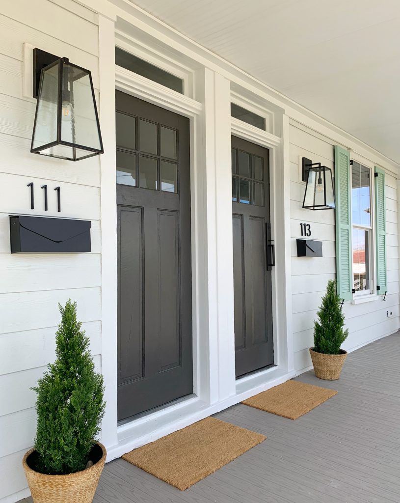 Duplex Front Porch From Angle With Oversized Black Lanterns And Matching Mailboxes