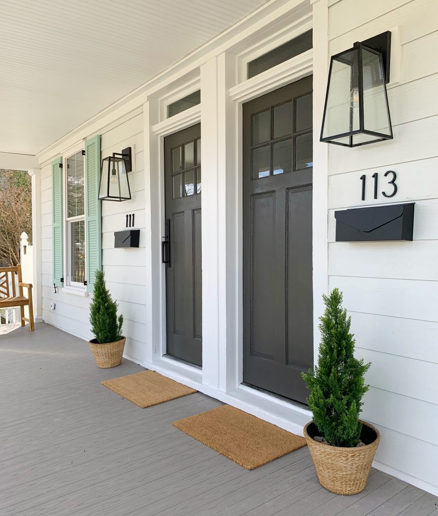 After Photo Of Front Doors With Dark Urbane Bronze Paint And Pale Patina Shutters