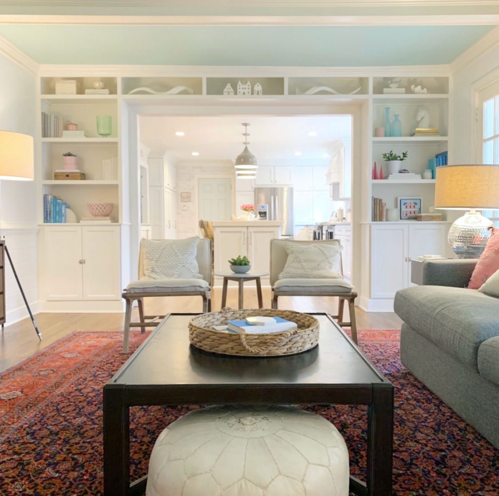 Living Room With Built In Bookcases and Wood Coffee Table