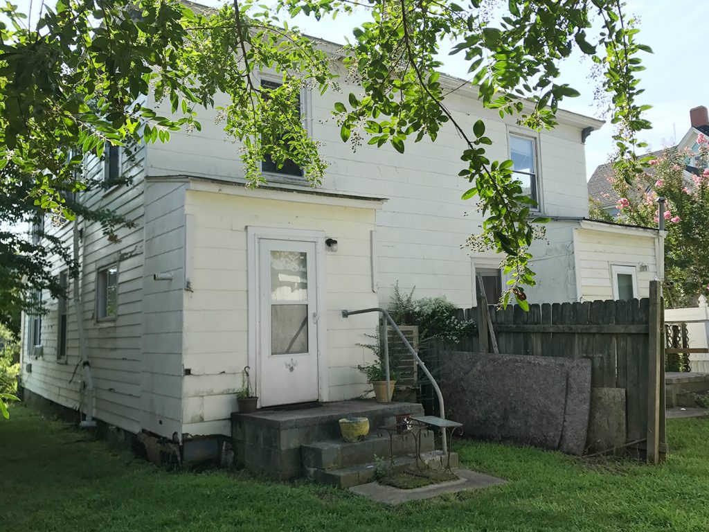 Before Photo Of Other Side Of Duplex Backyard With Old Stone Steps