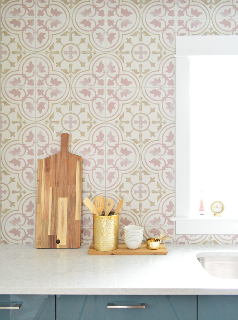 Close Up Of Pink Patterned Tile With Cutting Board Leaned Up