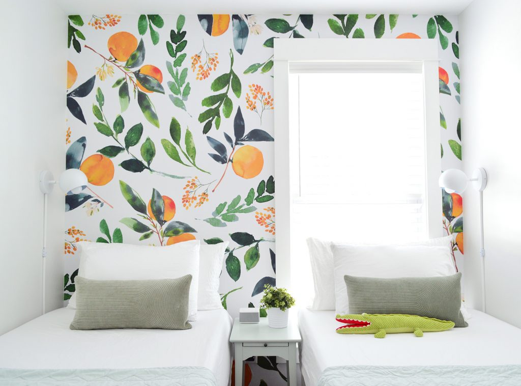 Twin Bed Sleeping Nook With Colorful Orange Leafy Wall Mural Accent Wall