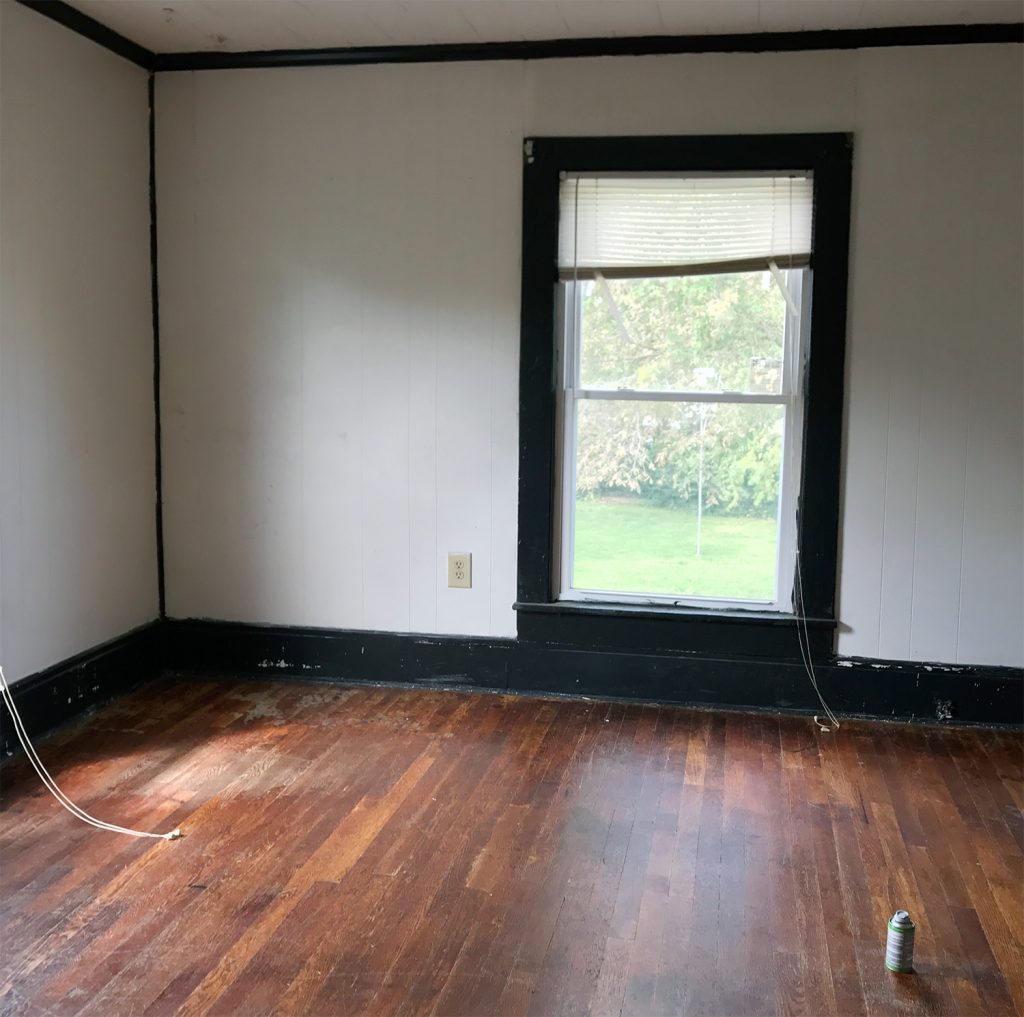 Before Photo Of Upstairs Bedroom With Dark Green Trim