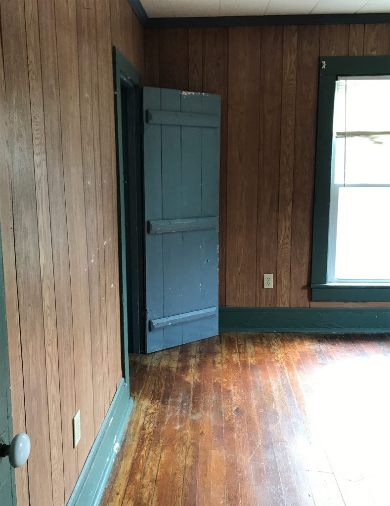 Before Photo of Front Bedroom With Small Closet Door