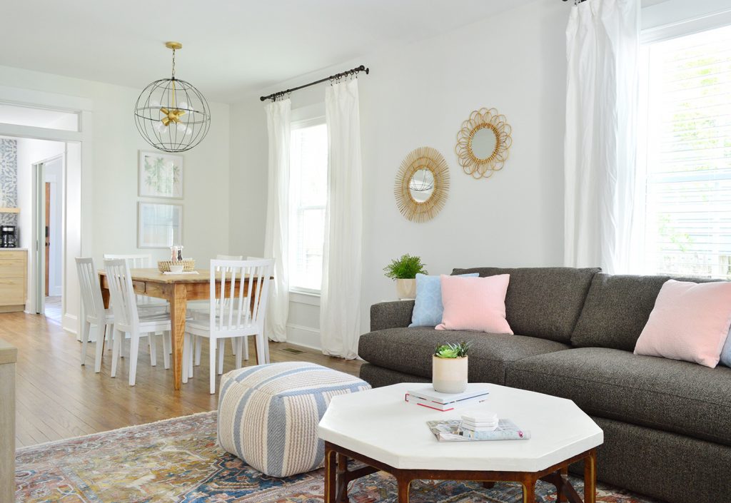 Open Living And Dining Space In Duplex With Crate And Barrel Sofa