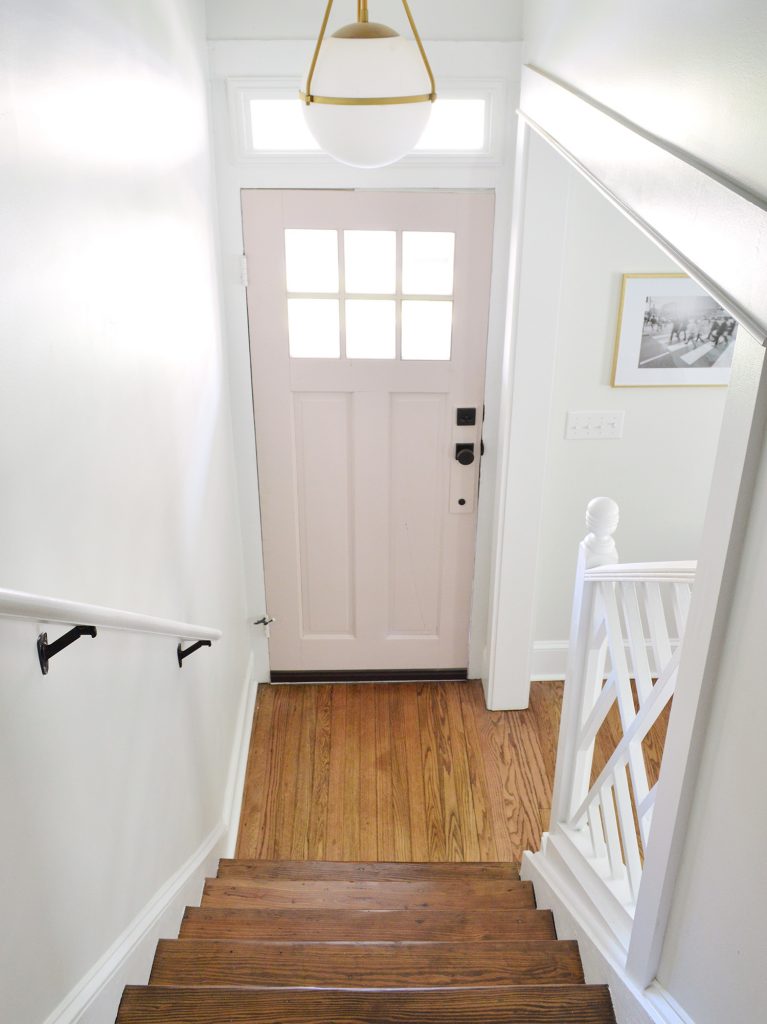 Duplex Stairs Entry Pink Looking Down At Door