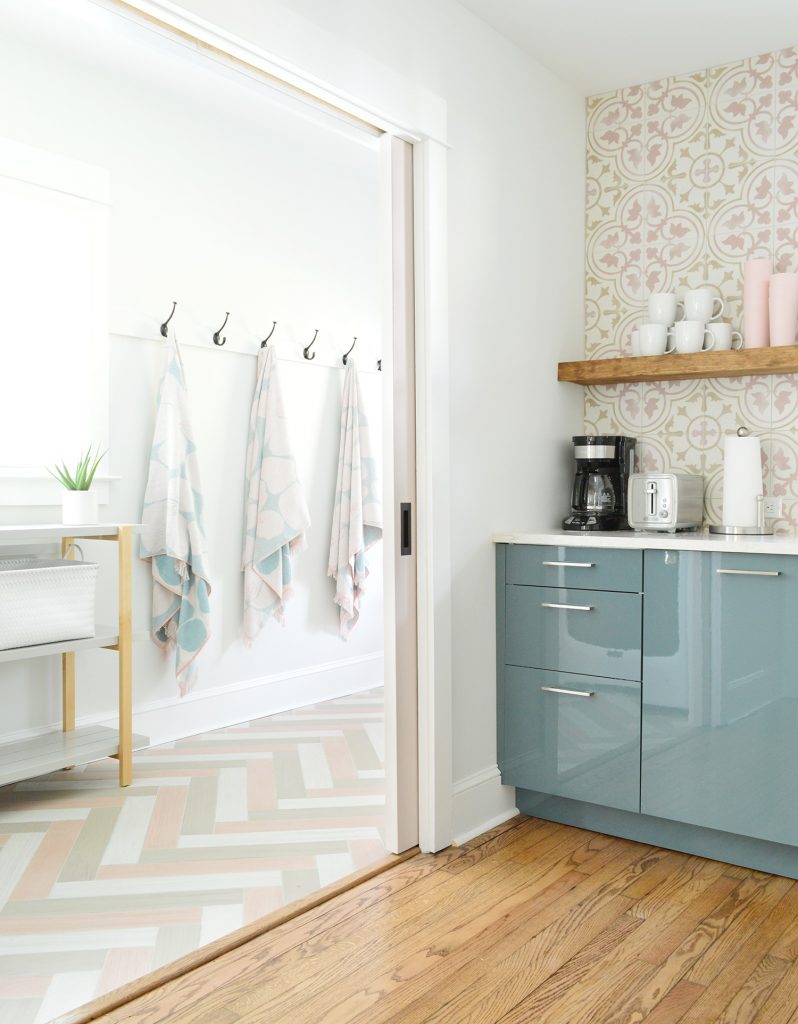 Hangin Towels Seen Through Kitchen Pocket Doors Into Mudroom