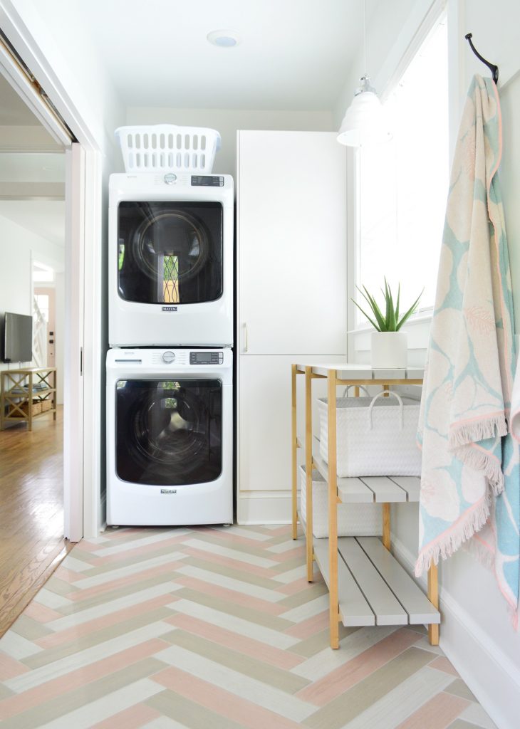 Stacked Washer Dryer In Duplex Laundry Mudroom With Open Shelf