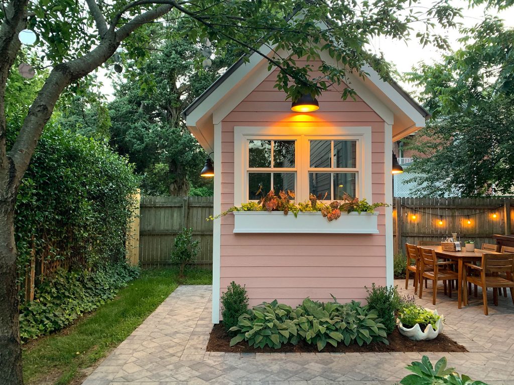 Small Pink Mellow Coral Shed In Beach House Backyard After