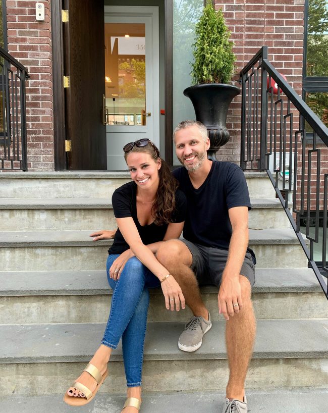 Sherry and John Petersik Sitting On Stoop Of New York Show House