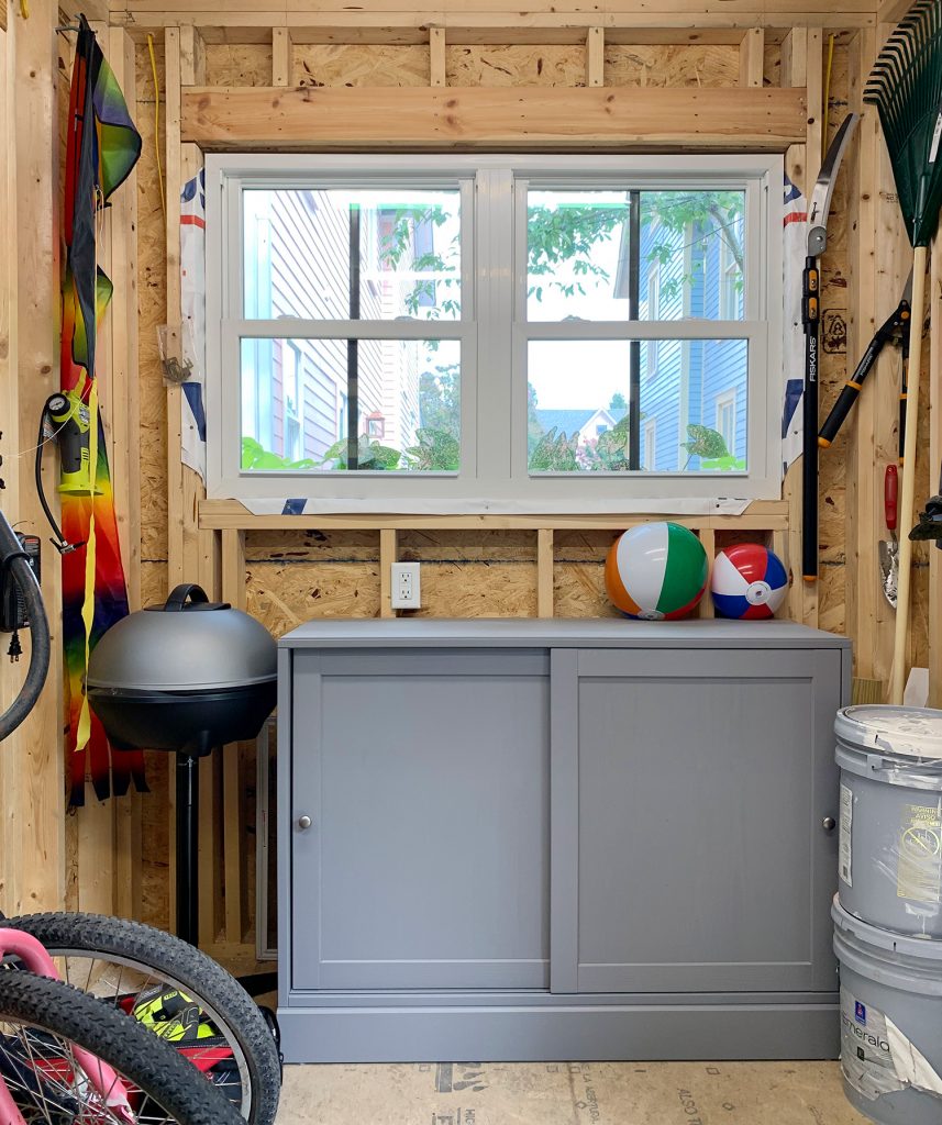 Beach Shed Window Wall With Gray Storage