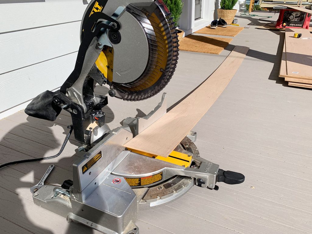 Miter Saw Set Up To Cut Panel Strip To Length