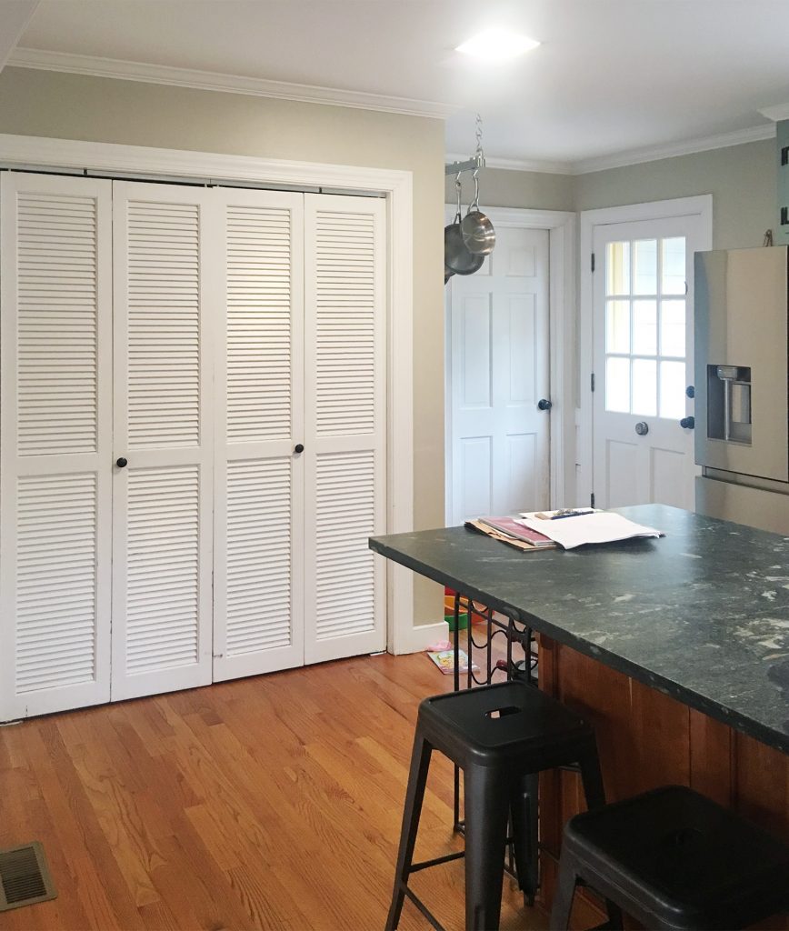 Before Photo Of Laundry Area In Kitchen With Bi Fold Doors And Island