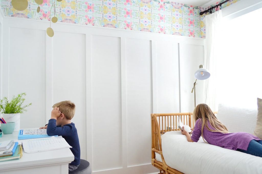 Kids Lounging In Bedroom With Board And Batten And Wallpaper