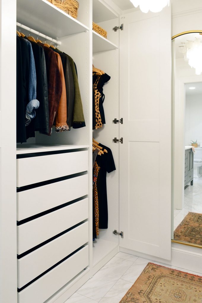 White Ikea Pax Closet With Three Hanging Bars And Drawers