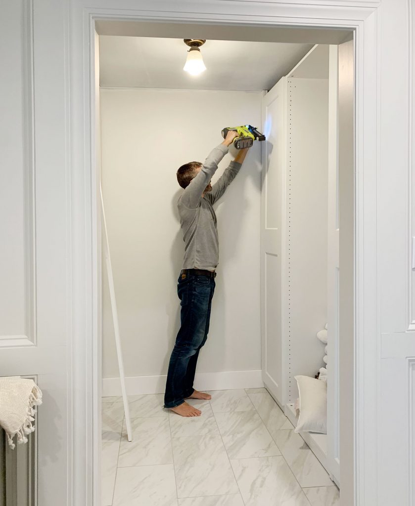 John Nailing Boards In Remodeled Ikea Closet