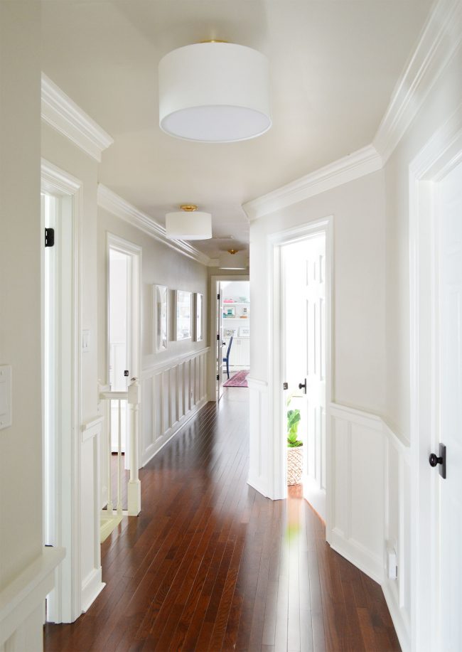 After Photo Of Hallway With Wood Floors And DIY Wainscoting Treatment Towards Bonus Play Room