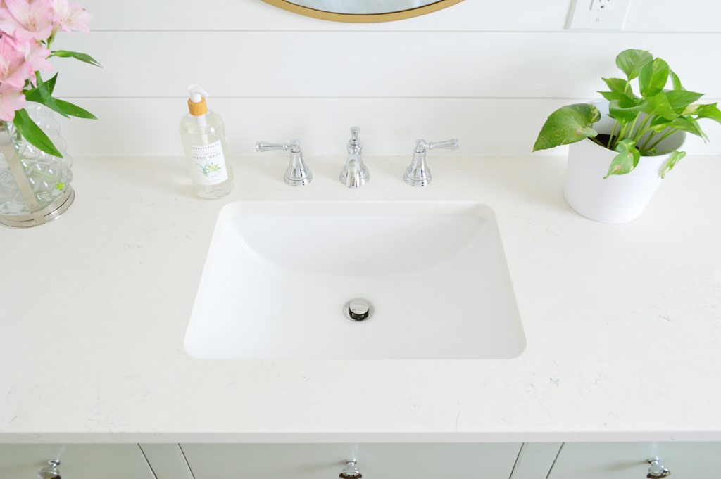 Bathroom vanity sink with silver faucet
