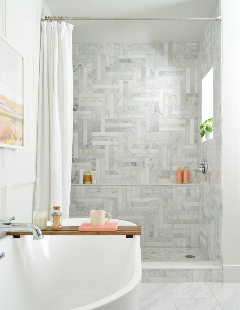 Walk In Shower Behind Freestanding Tub With Modern Herringbone Marble  Tile Pattern