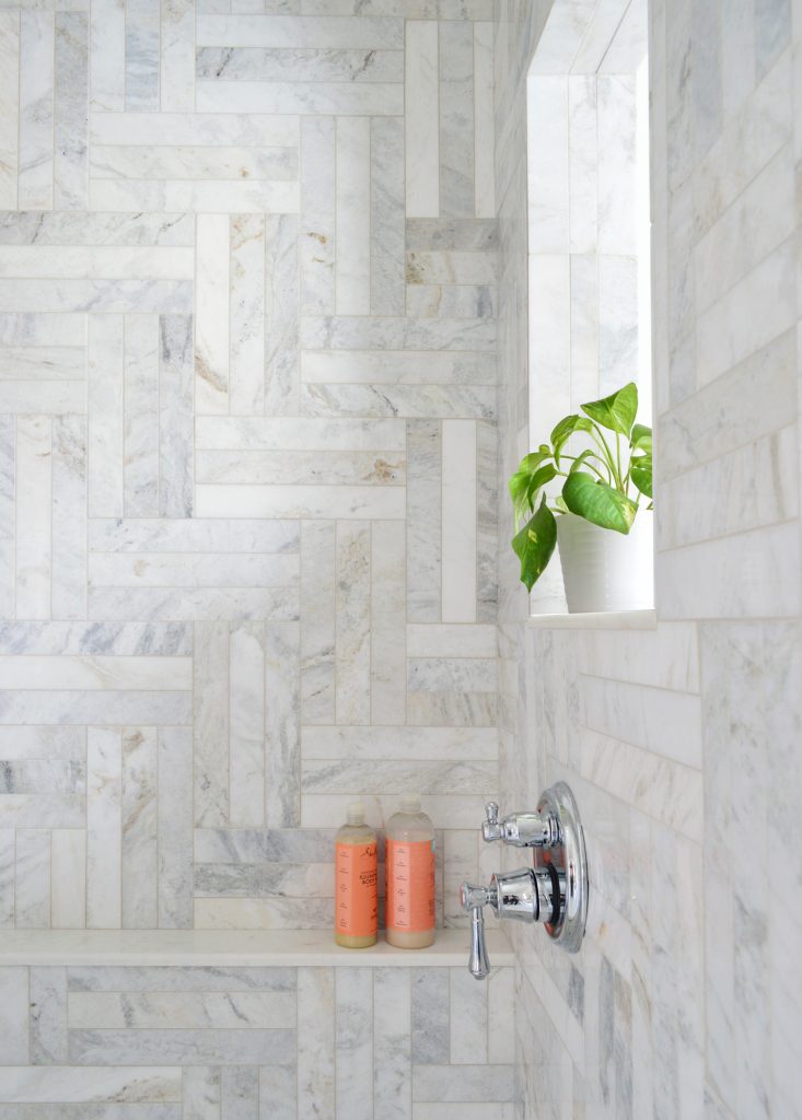 Detail Of Marble Bathroom With Intricate Herringbone Pattern