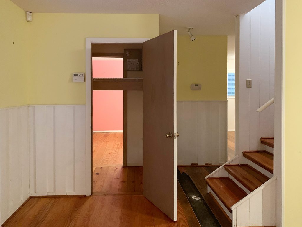 Before photo of laundry closet with single door an double-sided closet