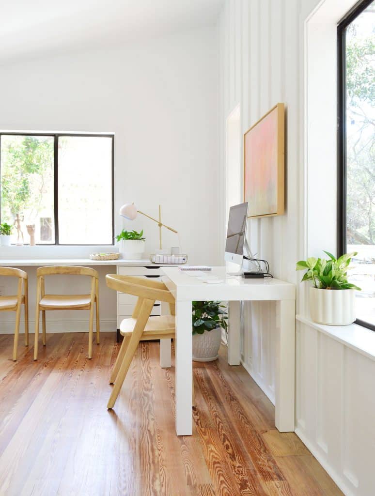 Two Desks In Beachy Living Room With Office Space