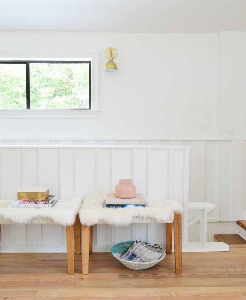 Planked Wall In Front Of Staircase With Benches