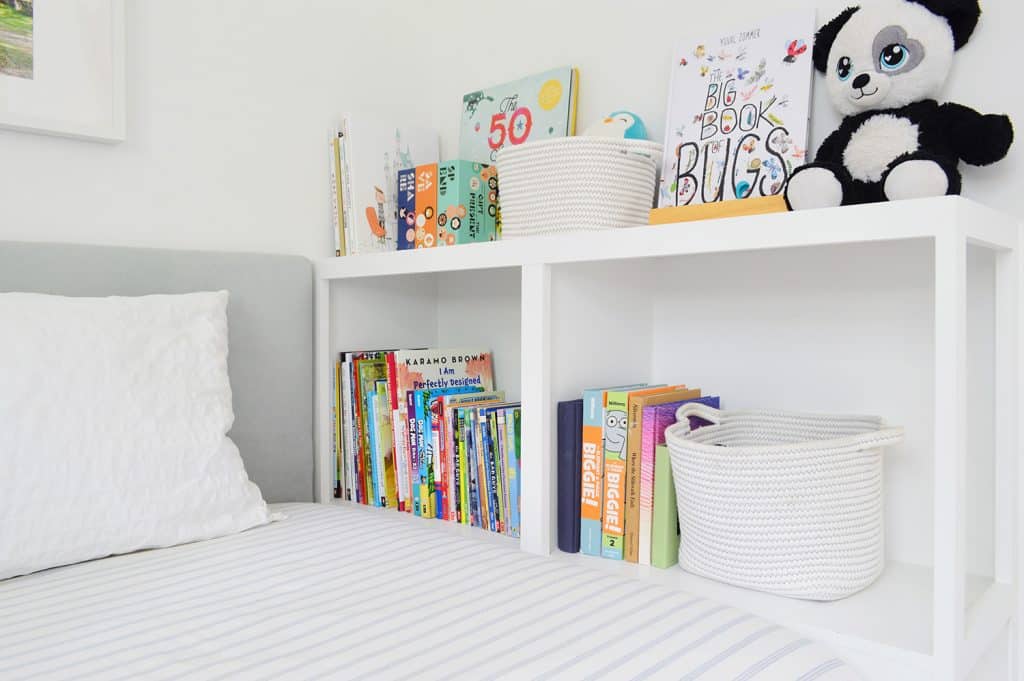 View of final bookcase built-in to the foot of boys custom daybed