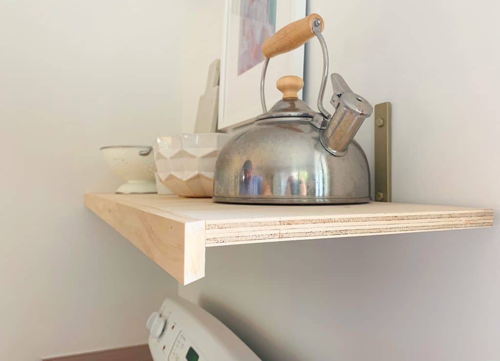 Exposed Side Of Floating Wood Shelf With Mitered Edge Face Frame