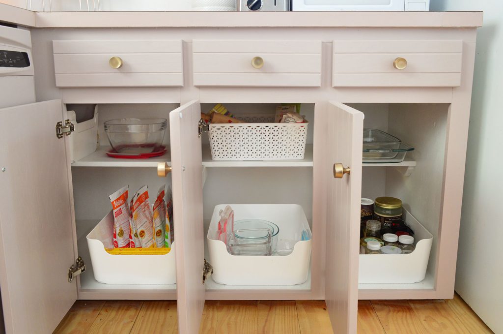 Hidden Hinges On Three Lower Cabinets With Bin Organization