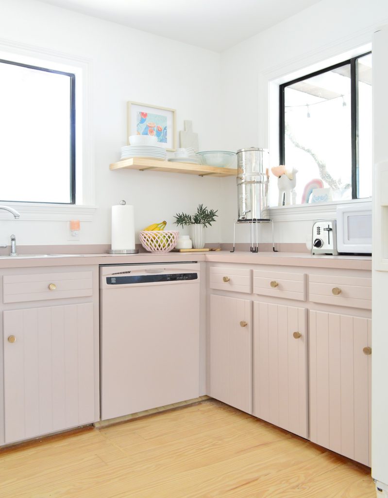 After photo of custom painted dishwasher to matching painted kitchen cabinets