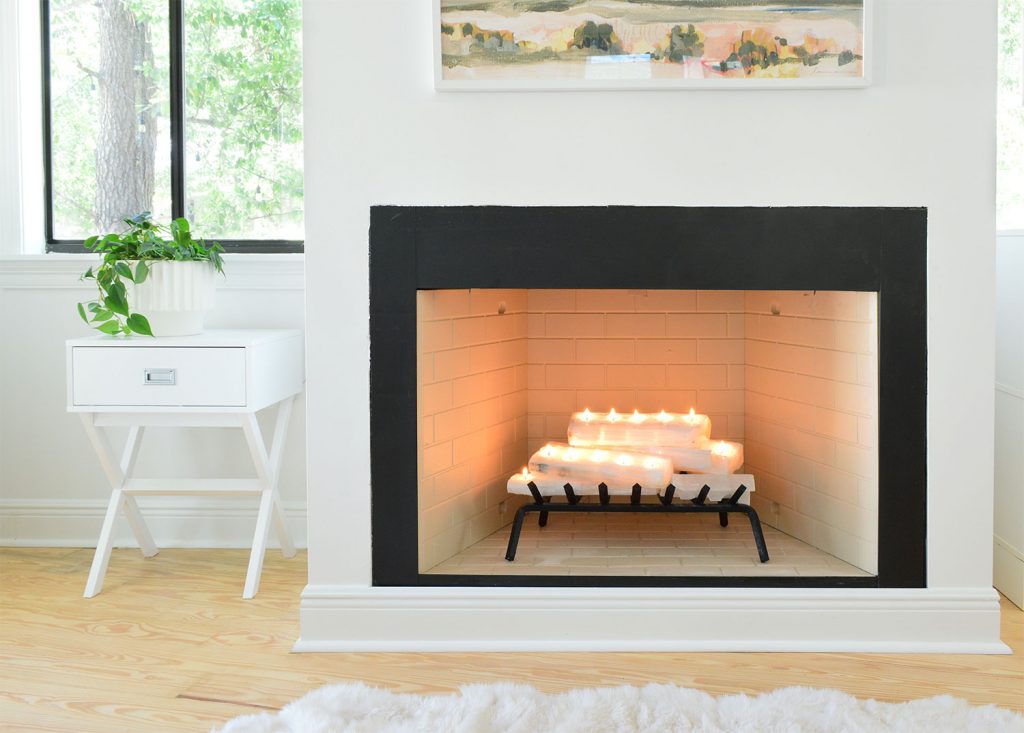 Straight shot of fireplace with crystal logs lit