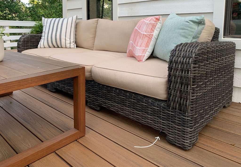 Arrow Pointing To Hidden Bungee Hook Under Outdoor Sofa