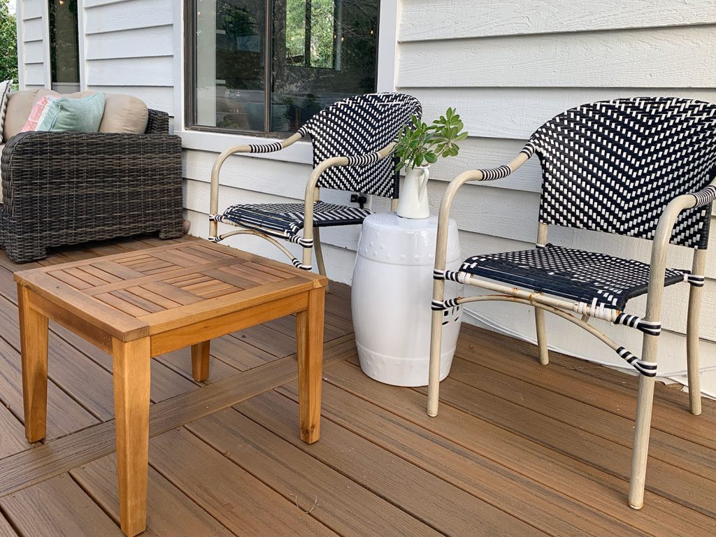 Black And White Woven Outdoor Chairs With Bits Of Rust